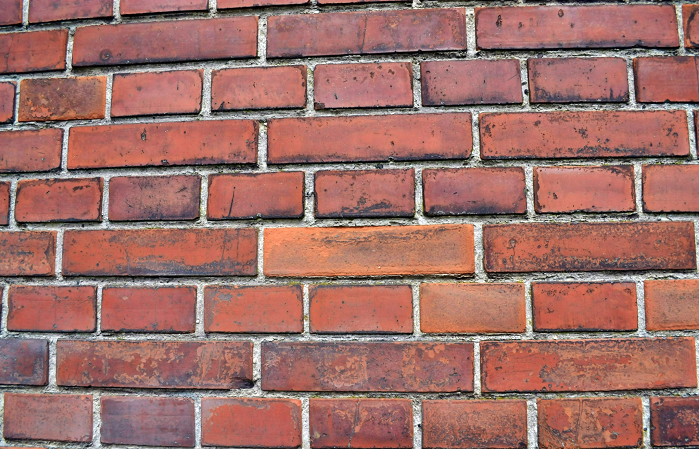 A wall of red bricks
